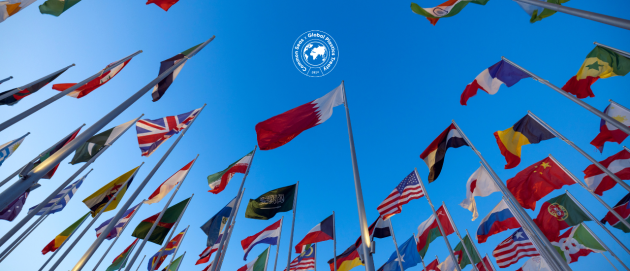 Blue sky with UN Member State Flags. In the middle is a white logo lockup: Common Seas X Plastics Treaty