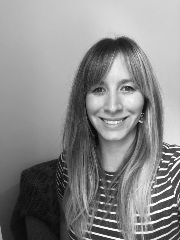 Profile photo of Sarah Duffy, Head of Education at Common Seas. Sarah wears a striped long-sleeved top and smiles at the camera. The photo is in greyscale.