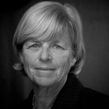 Profile photo of Sarah Dunn, Education Advisor at Common Seas. Sarah wears a dark coloured top and smiles slightly at the camera. Photo is in greyscale.