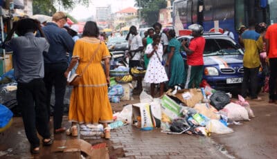 People walking on a littered street