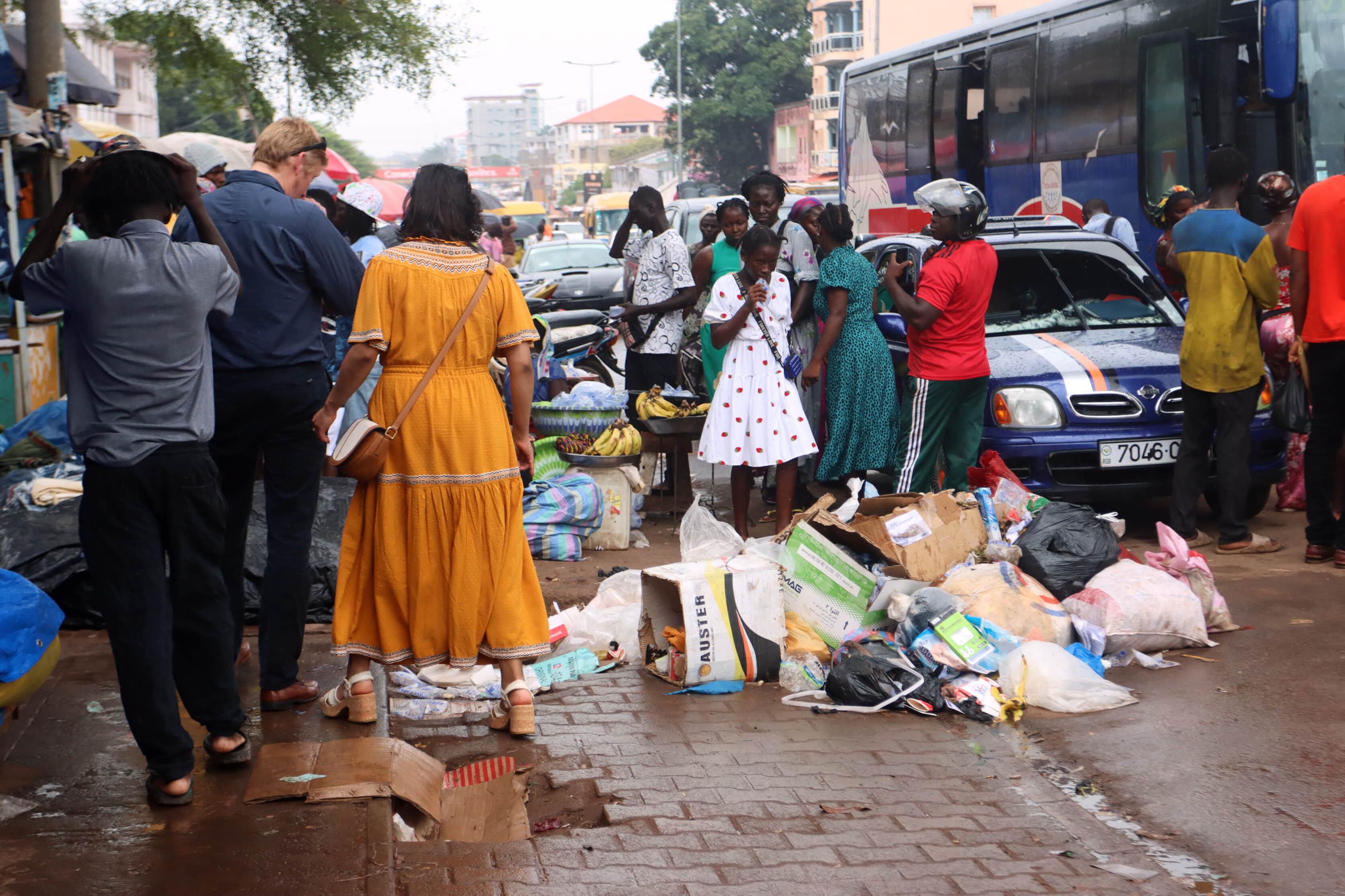 People walking on a littered street