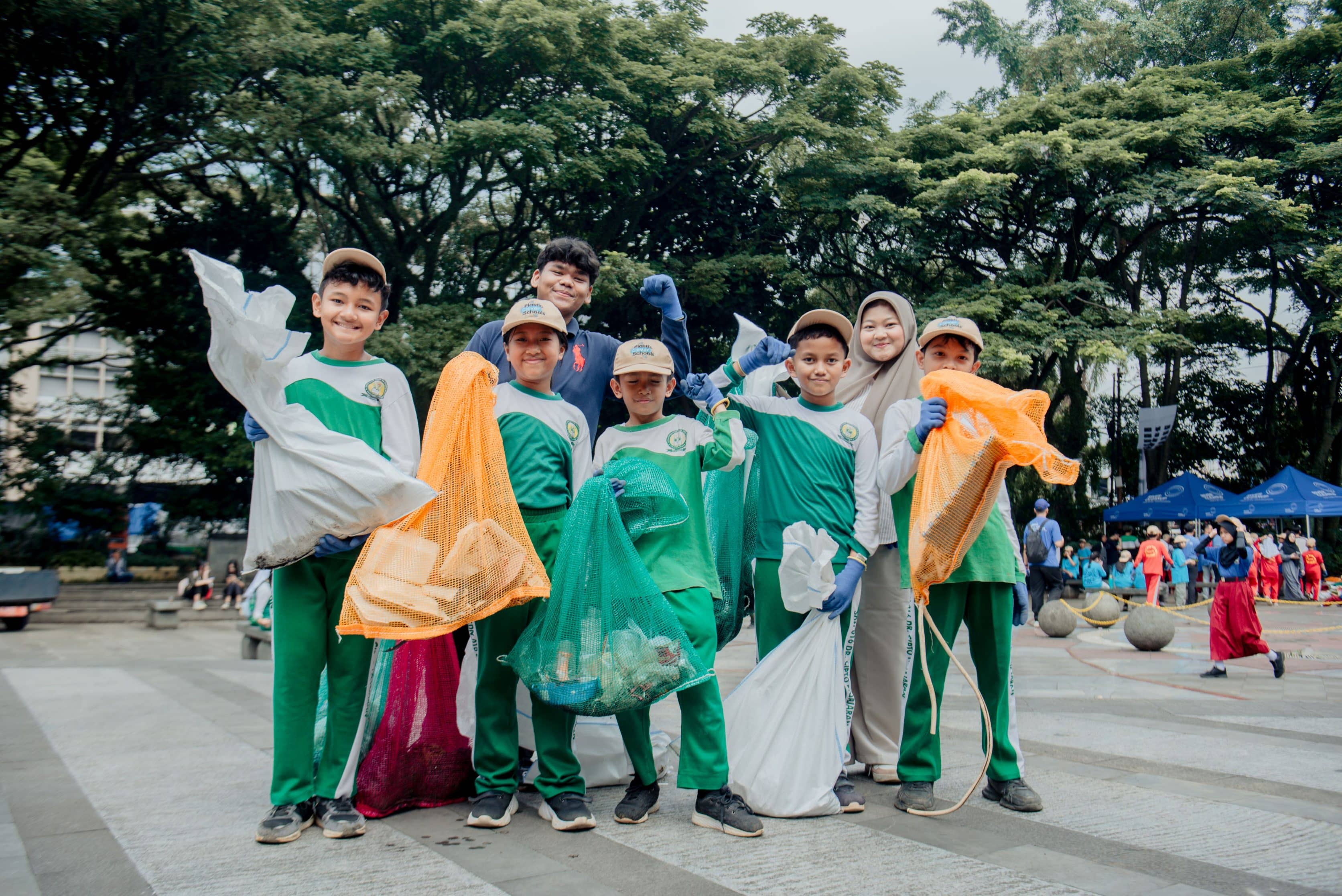 Children in Indonesia litter picking
