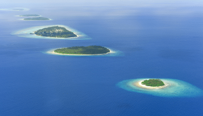 IOC regional EPR feasibility study - a series of small island separated by sea in the Indian Ocean, aerial view.